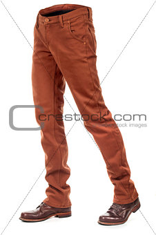 empty voluminous  jeans with boots on a white background