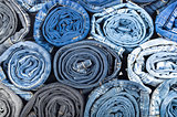background of a stack rolled jeans (vintage)