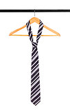 tie on a hanger on a white background