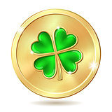 Golden coin with clover.