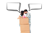 Composite image of happy young couple with moving boxes and piggy bank