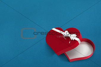 Red heart shaped open candy box