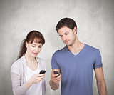 Composite image of couple using their mobile phones