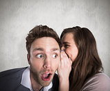 Composite image of woman whispering secret into friends ear