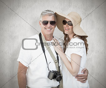 Composite image of vacationing couple