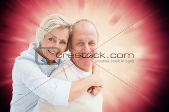 Composite image of happy mature couple smiling at camera