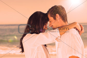 Couple embracing each other on the beach