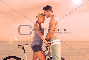 Cute couple together with their bicycles