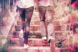 Hip young couple walking up steps