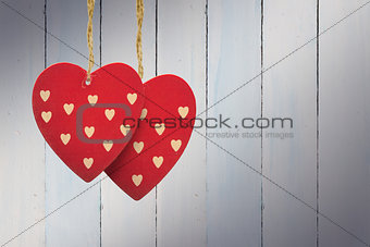Composite image of cute heart decorations