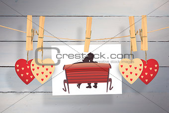 Composite image of couple on bench