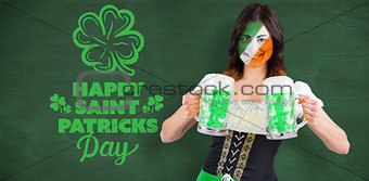 Composite image of irish girl with beer
