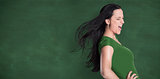 Composite image of brunette in green tshirt