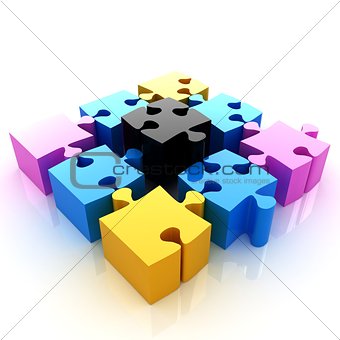 Puzzle of the four elements. Conceptual image - a palette CMYK