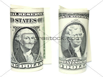 Closeup of one and two dollars isolate on white background.