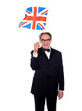 Senior UK supporter holding nations flag