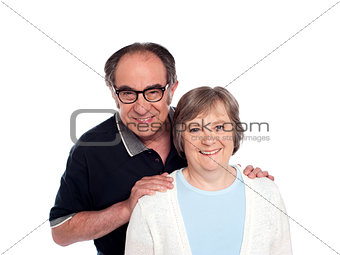 Lovable husband posing along with wife