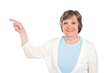 Matured casual lady pointing at copy space