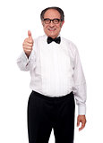Matured man showing thumbs up