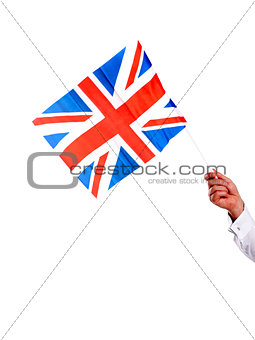 Image of males hand holding UK flag