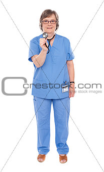 Senior lady doctor posing with stethoscope