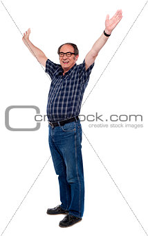 Mature man standing with open arms