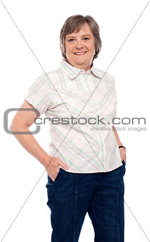 Isolated woman with hands in pocket