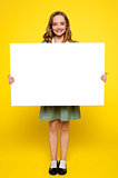 Girl showing white blank billboard