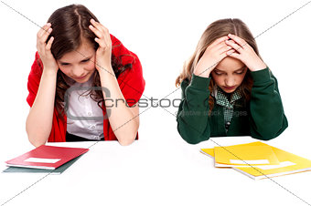 Confused students holding their heads