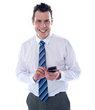 Smiling business professional messaging