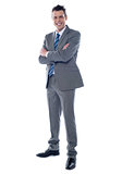 Businessman standing with arms crossed