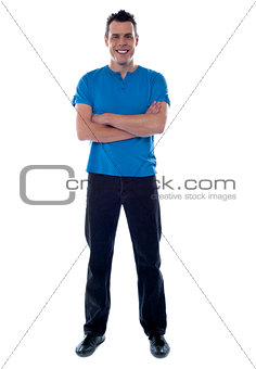 Full shot of a guy with crossed arms