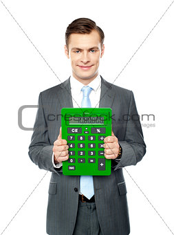 Corporate man showing big calculator