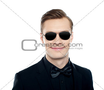 Trendy young male model wearing goggles
