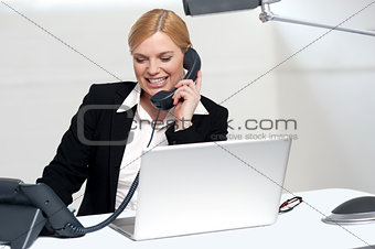 Female secretary communicating with her boss
