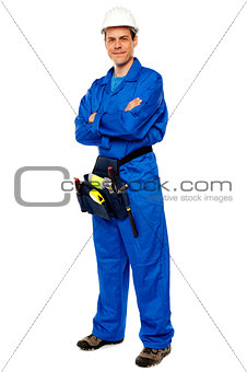 Industrial contractor posing with crossed arms