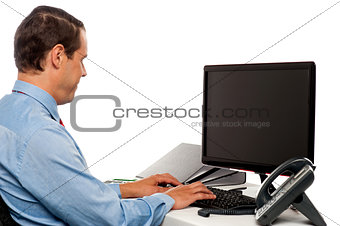 Side view male accountant working in office