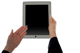 Female hand showing blank screen of tablet