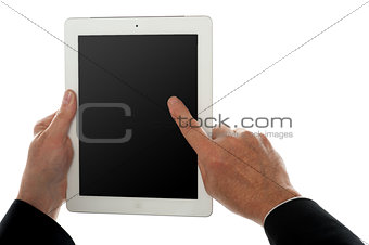 Finger of a man on tablet pc screen, closeup shot