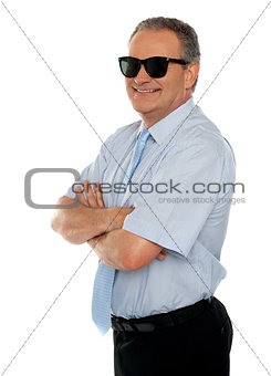 Confident male executive wearing sunglasses