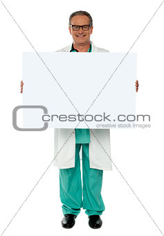 Senior medical professional displaying banner ad