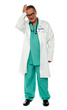 Full length shot of unhappy doctor in uniform
