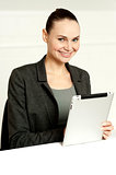 Corporate lady using wireless tablet device