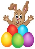 Young bunny with Easter eggs theme 1
