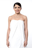 Attractive woman posing in towel