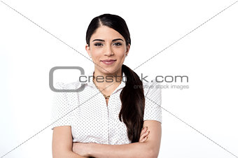 Pretty woman posing with folded arms