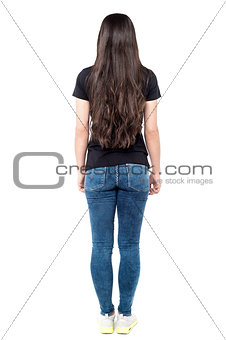 Back pose of young woman
