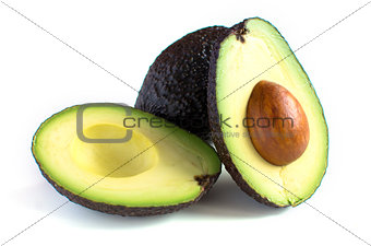 A fresh avocado cut in half