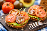 Avocado sandwich with tomatoes