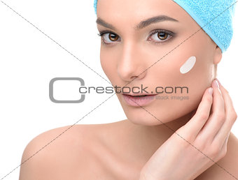 Spa care woman with perfect skin wearing hair towel after beauty treatment. Isolated on white background.